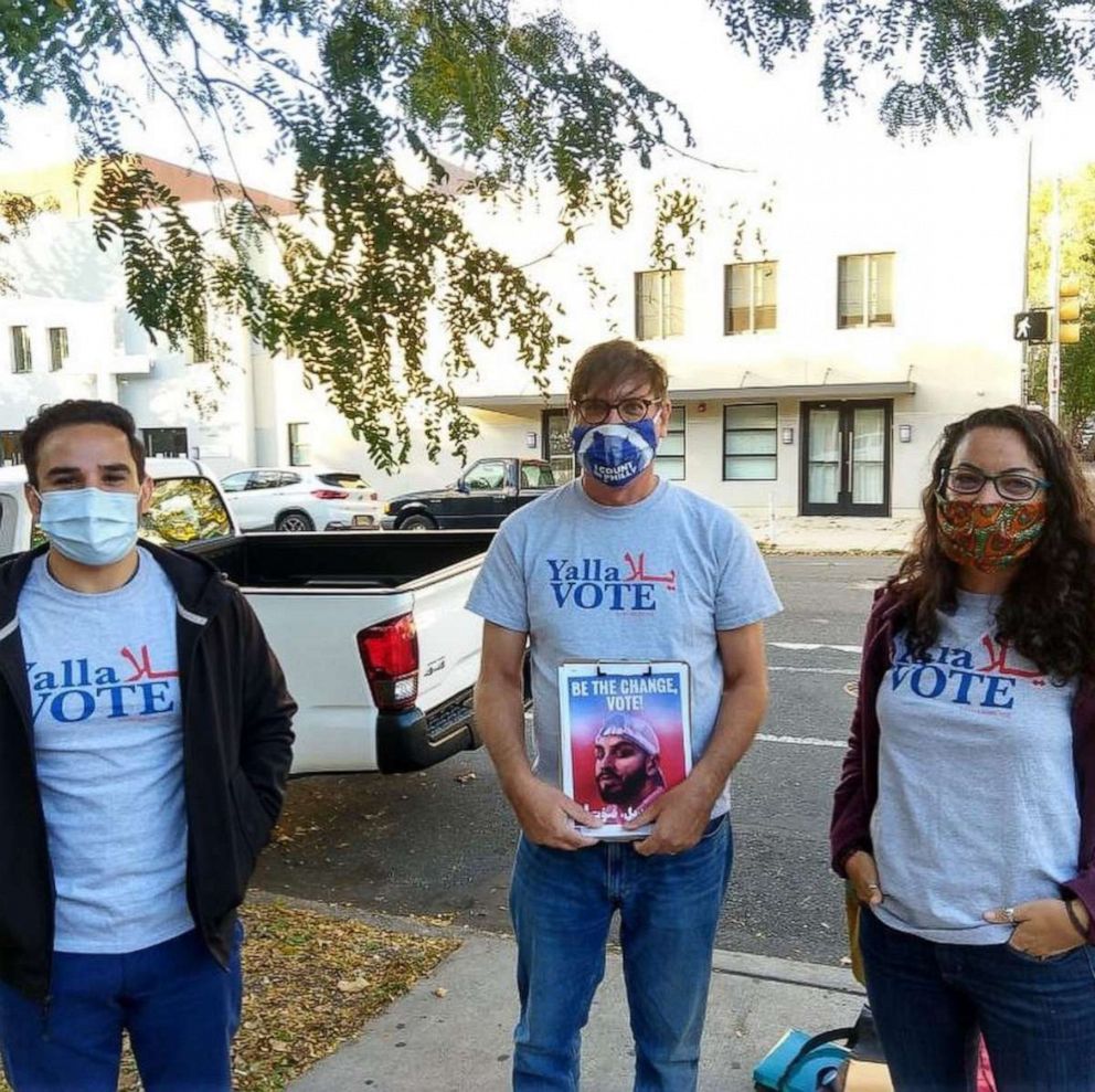 PHOTO: Philadelphia Arab-American Development Corporation volunteers encourage people to vote on National Arab American voter registration day in Philadelphia.