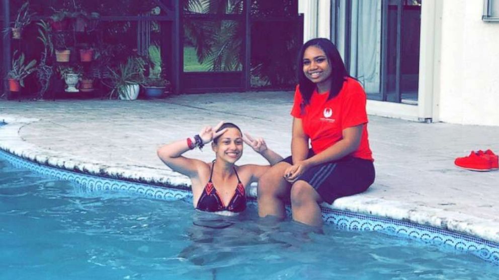 "Chicago Peace Warrior Arieyanna Williams, 17, poses with Parkland High School Shooting survivor Emma Gonzalez at the pool during their meet up discussing gun reform on March 3, 2018.