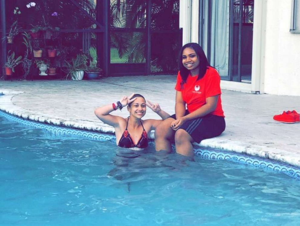PHOTO: Chicago Peace Warrior Arieyanna Williams, 17, poses with Parkland High School Shooting survivor Emma Gonzalez at the pool during their meet up discussing gun reform on March 3, 2018.