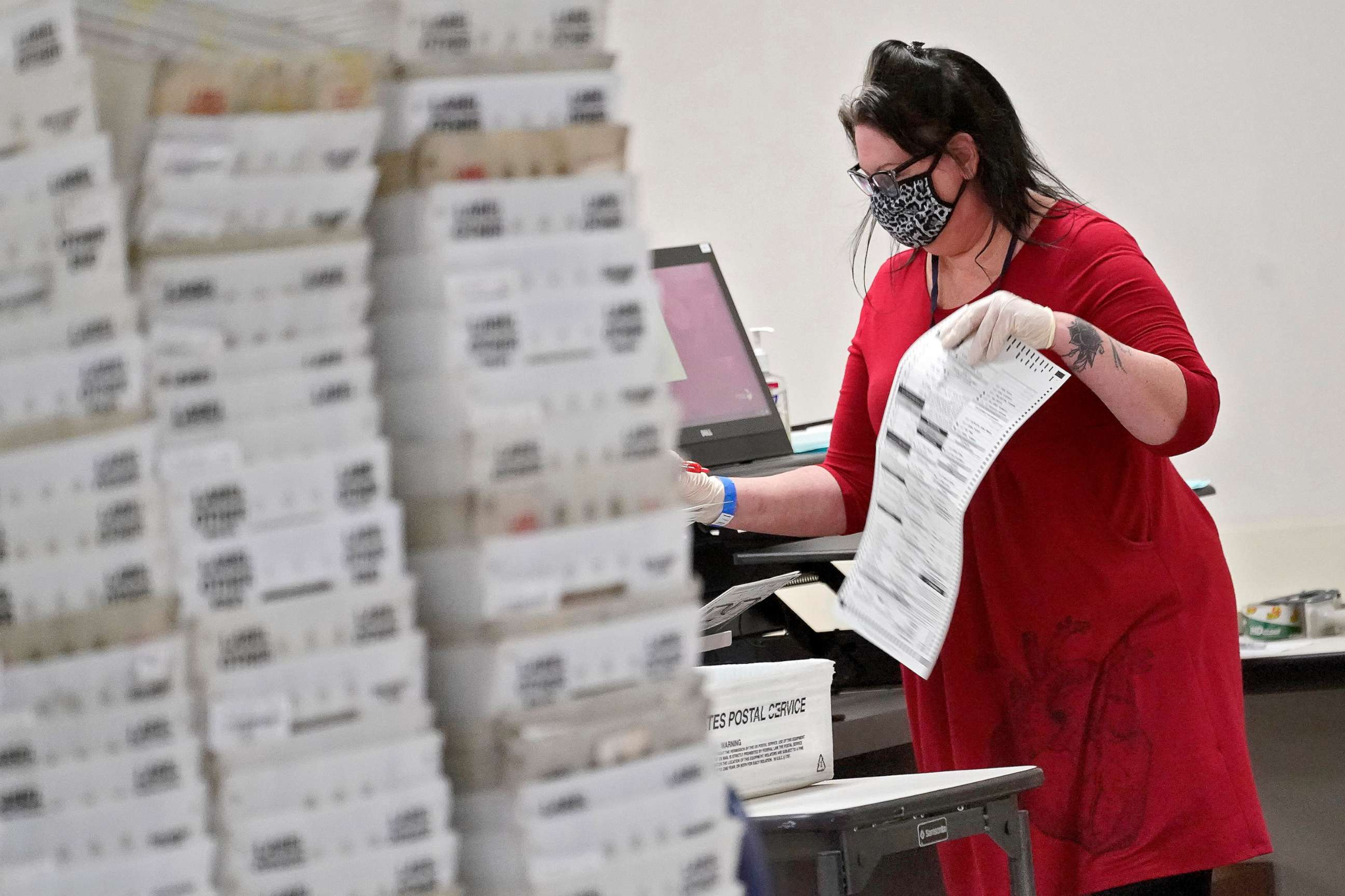 PHOTO:Arizona elections officials continue to count ballots inside the Maricopa County Recorder's Office, Nov. 6, 2020, in Phoenix.