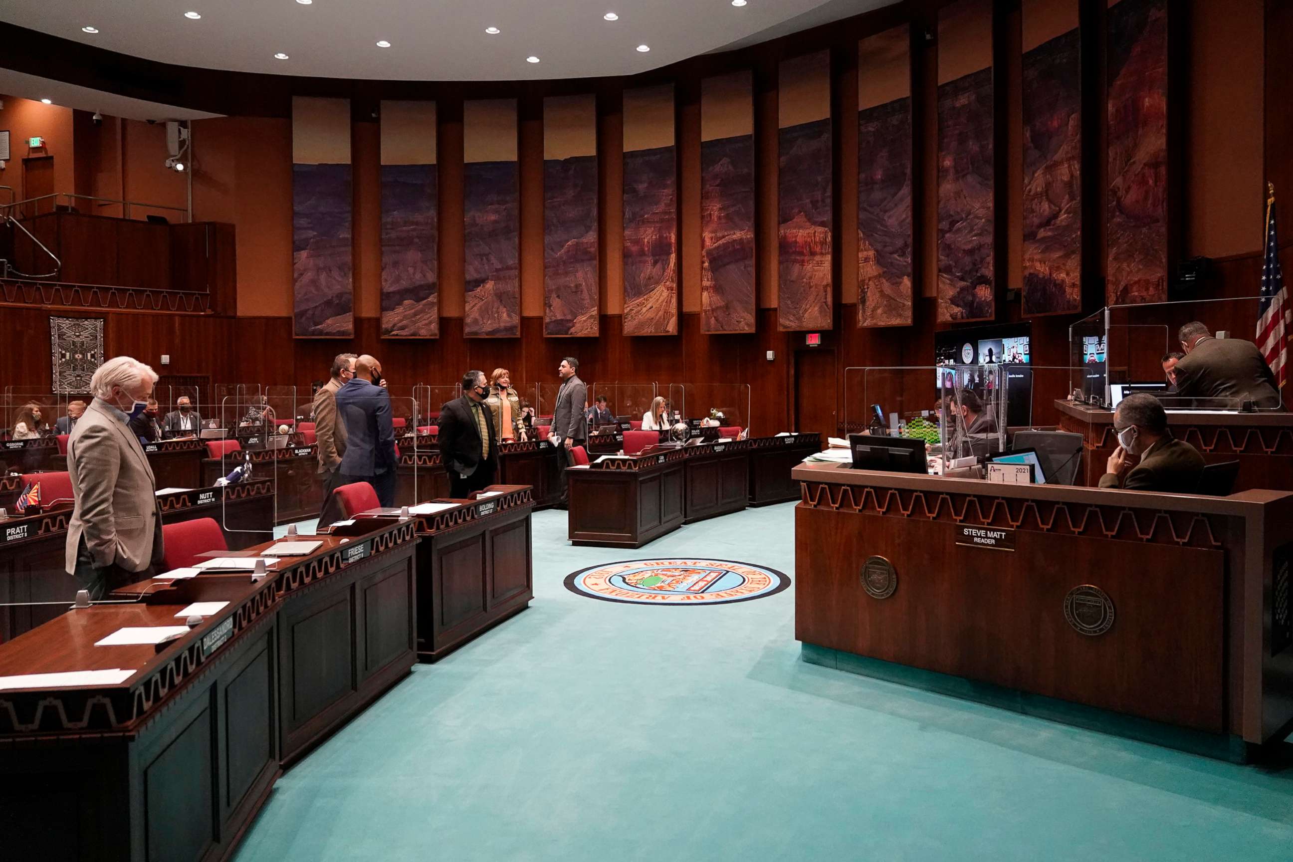 PHOTO: State representatives gather at the Capitol, in Phoenix, Feb. 18, 2021. 