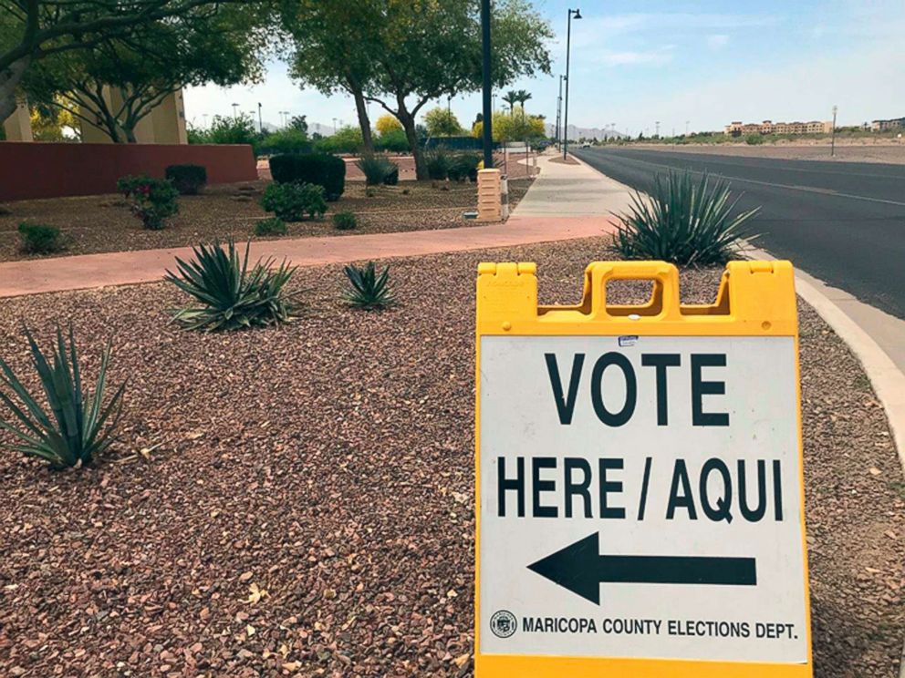 PHOTO: A sign directing voters to an early-voting location in Surprise, Ariz., April 11, 2018. 