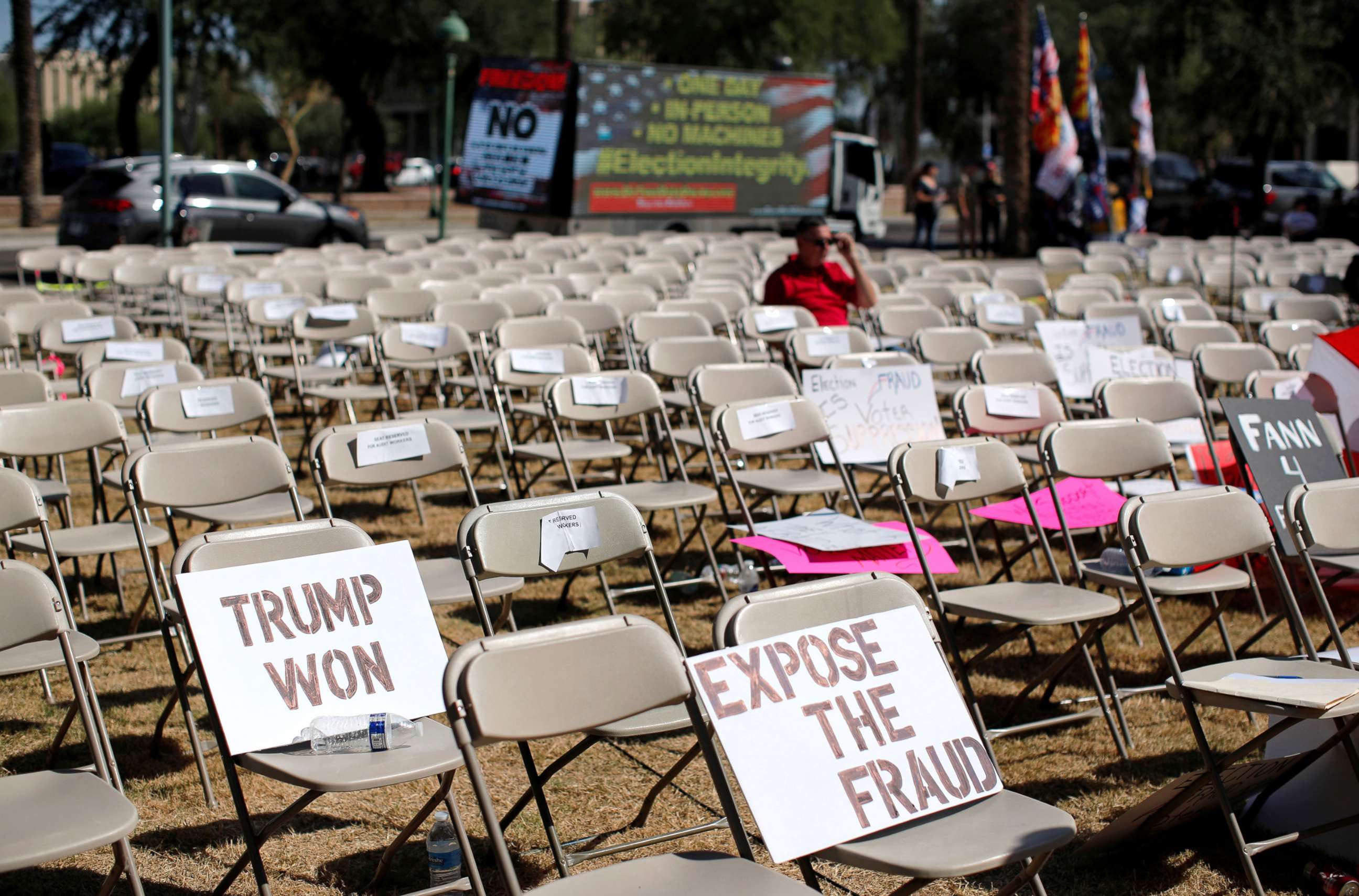 PHOTO: In this Sept. 24, 2021, file photo, placards are seen on empty chairs outside the Senate after people leave after listening to the announcement of interim findings from a widely criticized audit of the 2020 election in Phoenix.