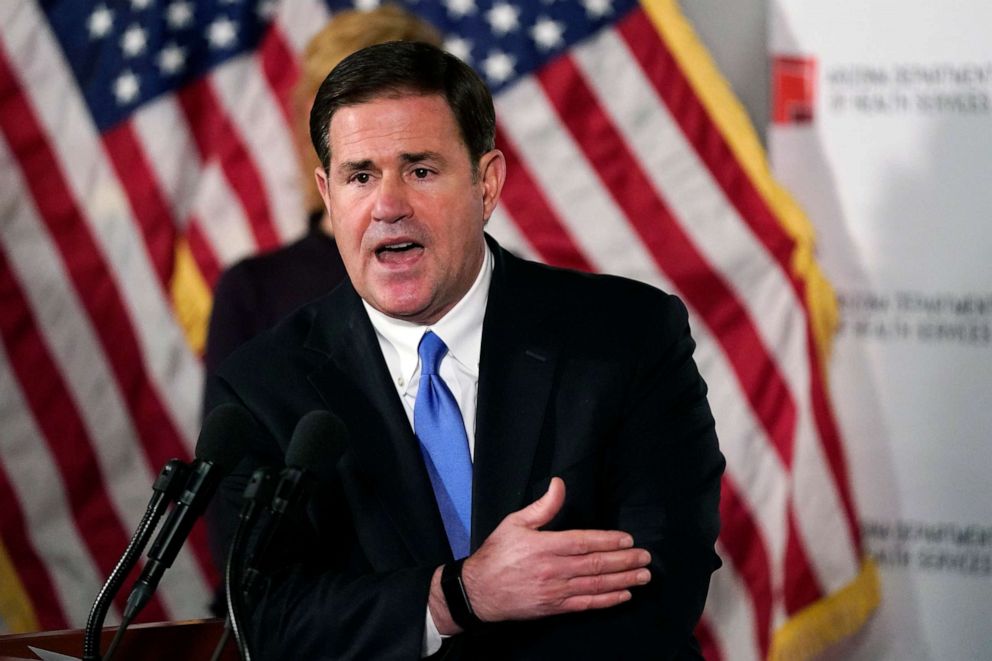 PHOTO: Arizona Gov. Doug Ducey answers a question during a news conference in Phoenix, Dec. 2, 2020.