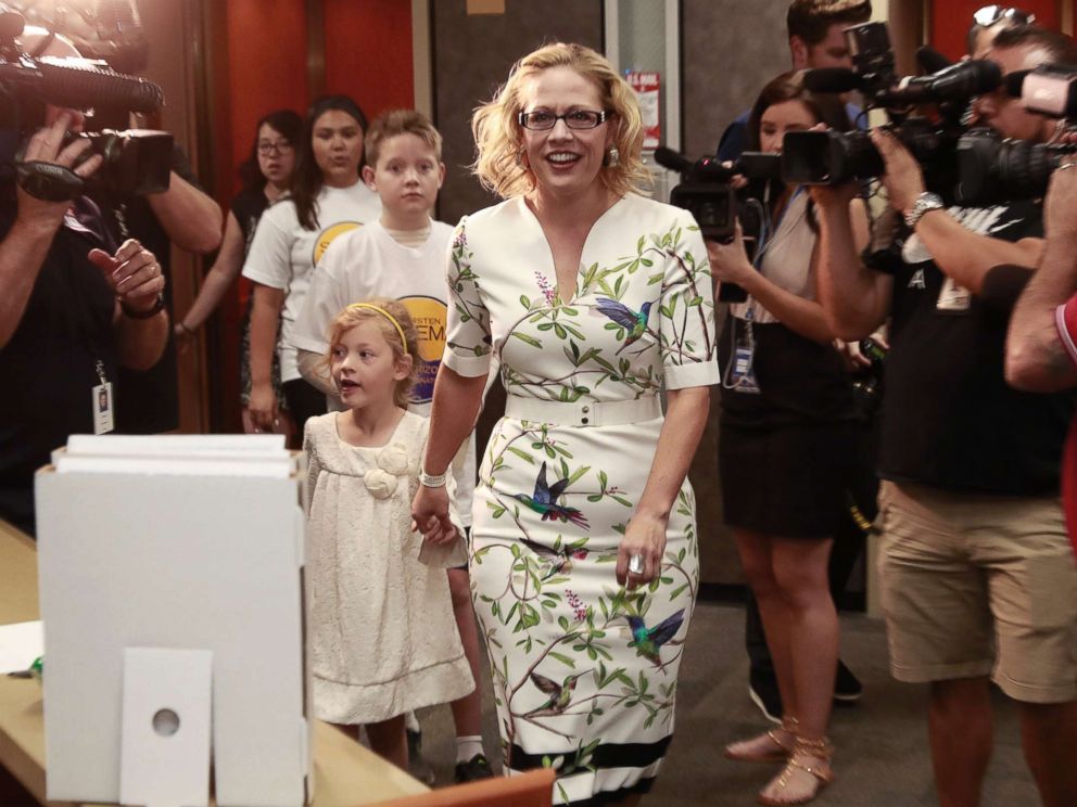 PHOTO: Rep. Kyrsten Sinema arrives to deliver her ballot signatures, May 29, 2018, at the Capitol in Phoenix. Sinema hopes to become the first Democrat to represent Arizona in the Senate in 30 years.