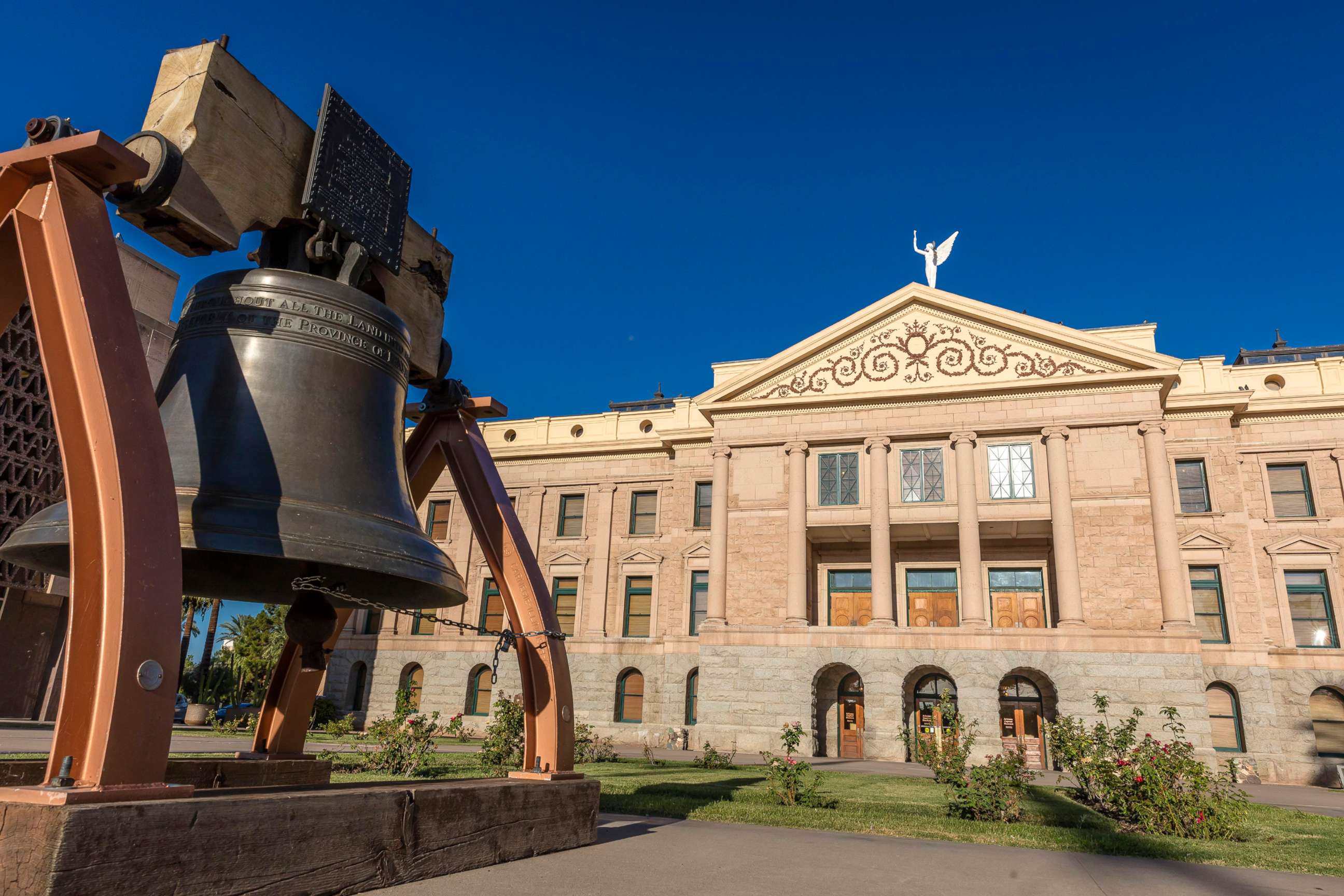PHOTO: A replica of the Liberty Bell is shown in front of the Arizona State Capitol Building in Phoenix.