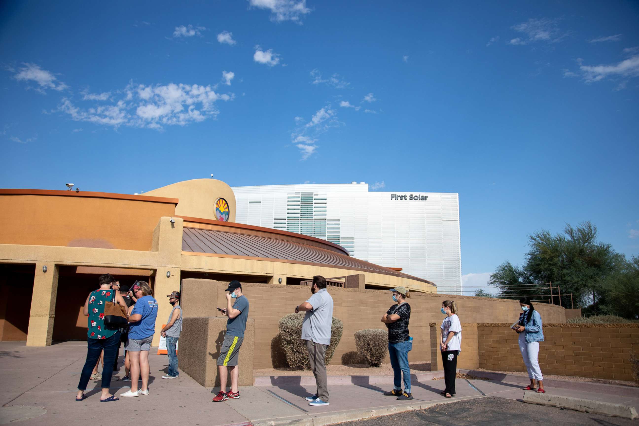 PHOTO: In this Nov. 3, 2020, file photo, voters wait to cast their ballots at Marquee Theatre in Tempe, Arizona.