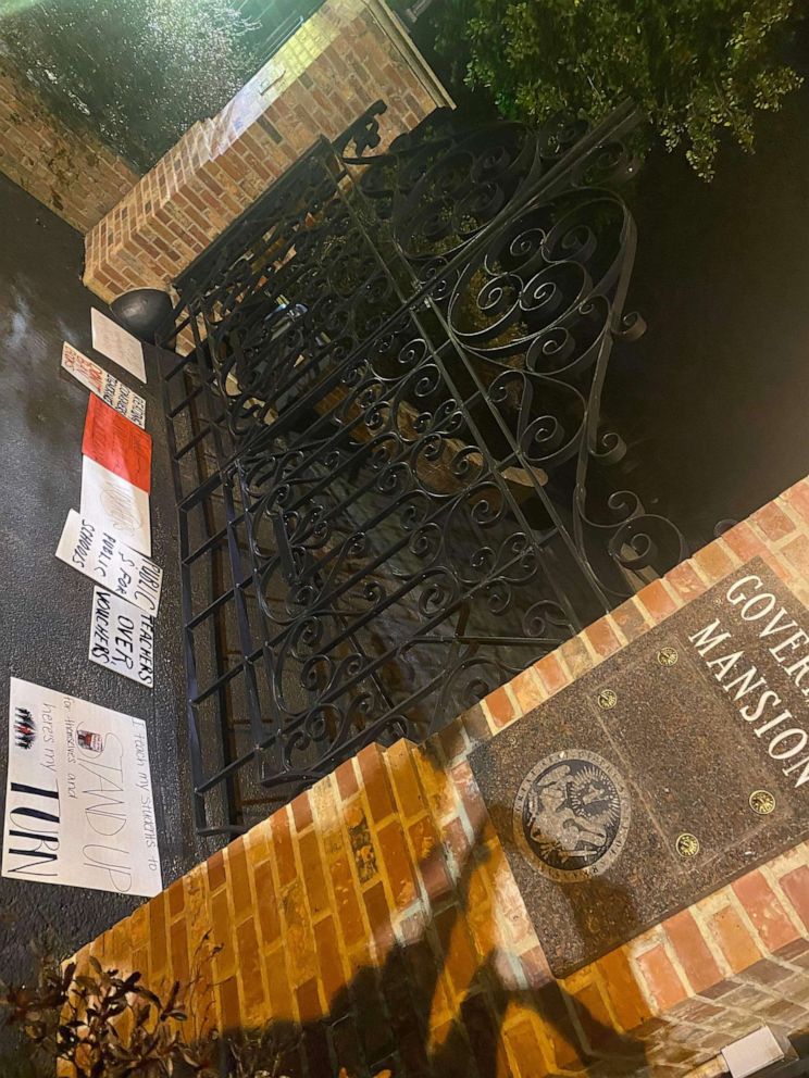PHOTO: Homemade signs opposing school voucher policies were left in front of the Arkansas Governor’s Mansion in Little Rock, Ark., Feb. 20, 2023.