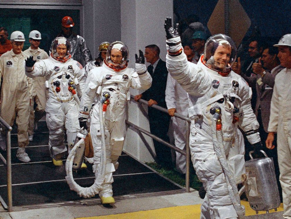 PHOTO: Neil Armstrong, right, along with Michael Collins and Buzz Aldrin walk to the van that will take the crew to the launchpad at Kennedy Space Center on Merritt Island, Fla., July 16, 1969.