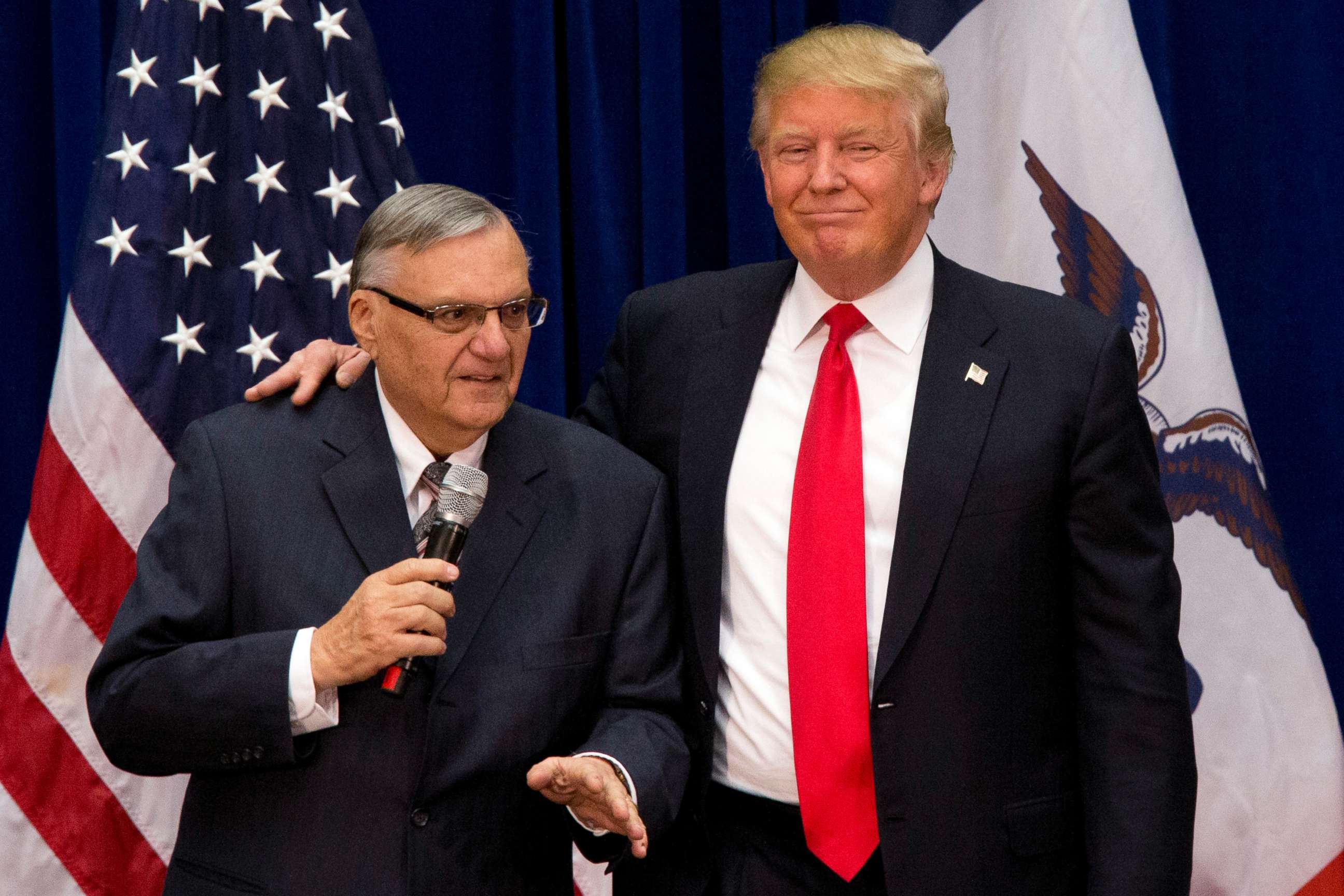 PHOTO: Then-Republican presidential candidate Donald Trump is joined by Joe Arpaio on Jan. 26, 2016, at a campaign event in Marshalltown, Iowa. 