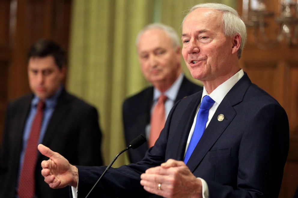 PHOTO: Gov. Asa Hutchinson speaks in Little Rock Ark., on March 23, 2020. Gov. Hutchinson is resisting issuing a broad stay-at-home order to curb the coronavirus outbreak, even as the state's cases continue to increase.