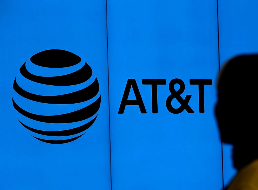 PHOTO: The logo of AT&T is visible outside of AT&T corporate headquarters on March 13, 2020, in Dallas, Texas.