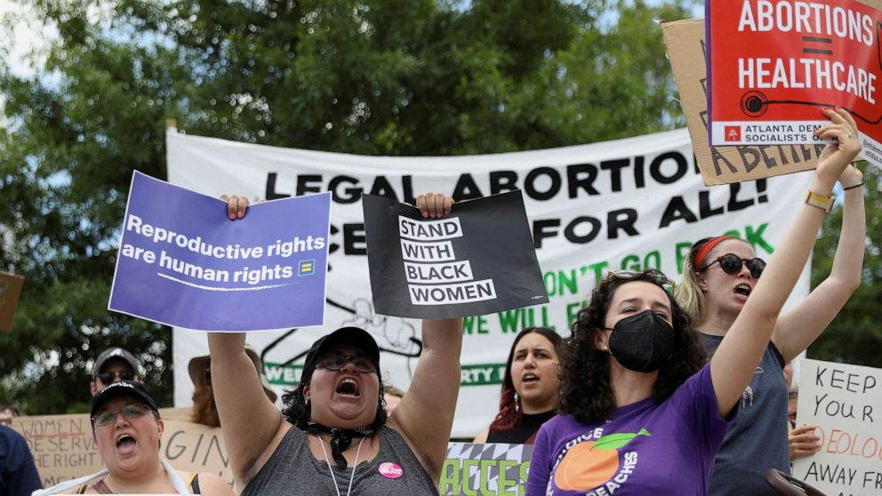 PHOTO: In this May 14, 2022, file photo, abortion rights protesters participate in nationwide demonstrations following the leaked Supreme Court opinion suggesting overturning the Roe v. Wade abortion rights decision, in Atlanta.