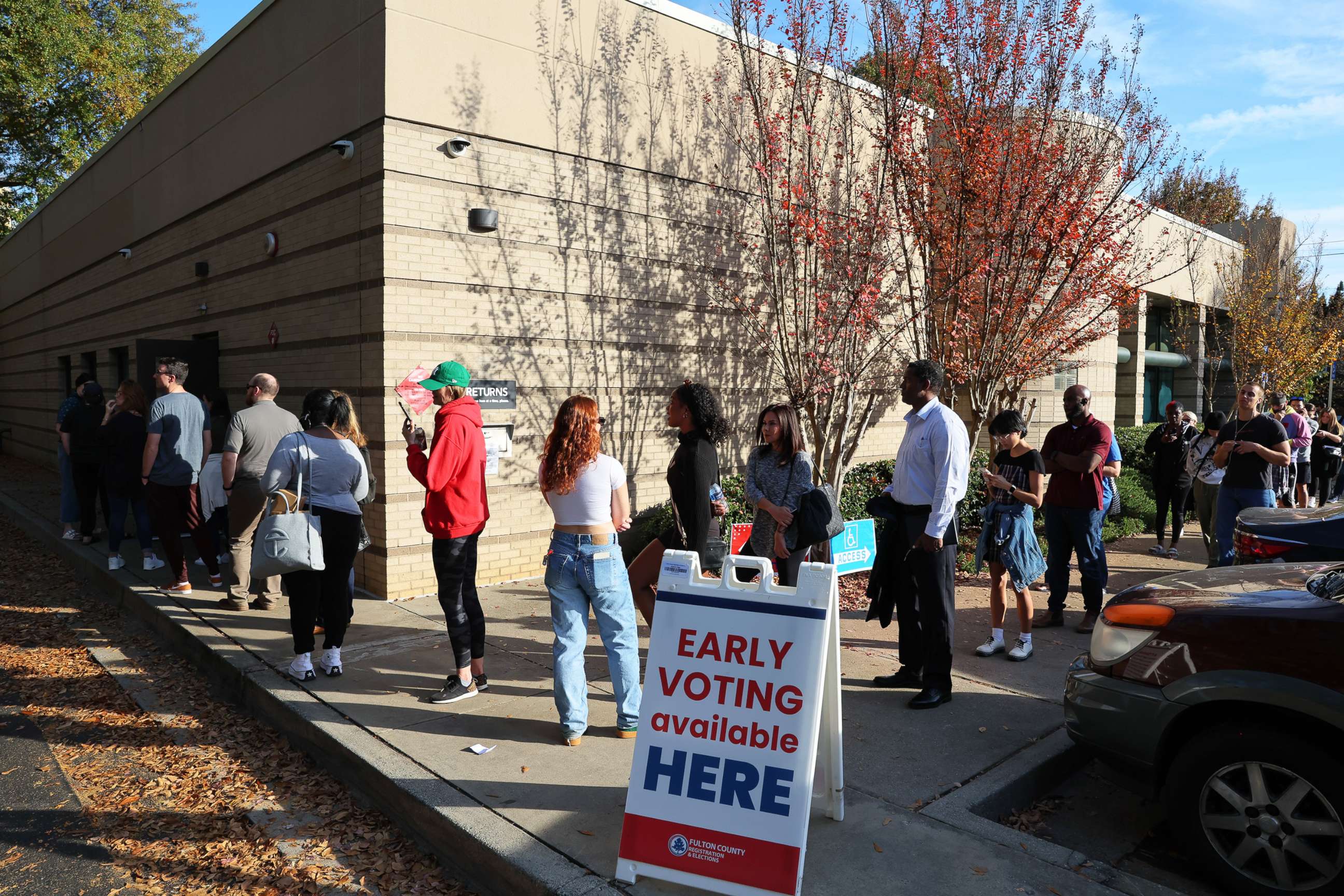 PHOTO: People wait in line for early voting for the midterm elections at Ponce De Leon Library on Nov. 4, 2022, in Atlanta.