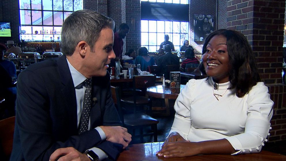 PHOTO: ABC News' Devin Dwyer talks with Alisha Cromartie at Paschal's Soulfood about impeachment and the Democratic presidential primary, Nov. 17, 2019.