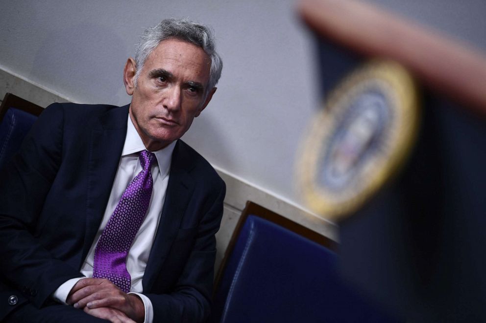 PHOTO: Member of the coronavirus task force Scott Atlas listens to US President Donald Trump during a briefing at the White House, Aug. 10, 2020.