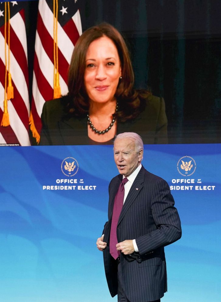 PHOTO: President-elect Joe Biden speaks as Vice President-elect Kamala Harris looks on via video during a news conference at The Queen theater in Wilmington, Del., Dec. 16, 2020. 