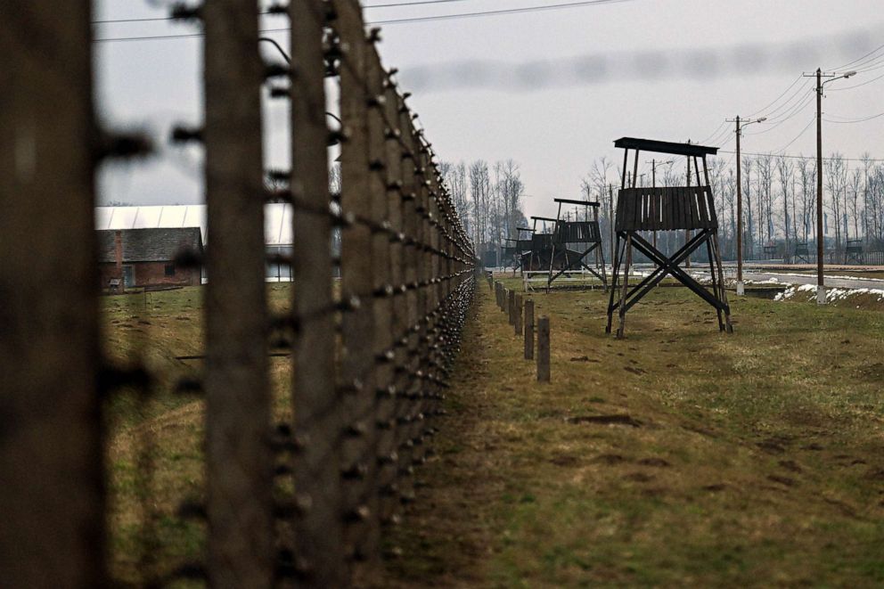 PHOTO: FILE - A view of barbed wire fence and surveillance towers at the former Nazi death camp Auschwitz Birkenau, Jan. 26, 2023 in Oswiecim, Poland.
