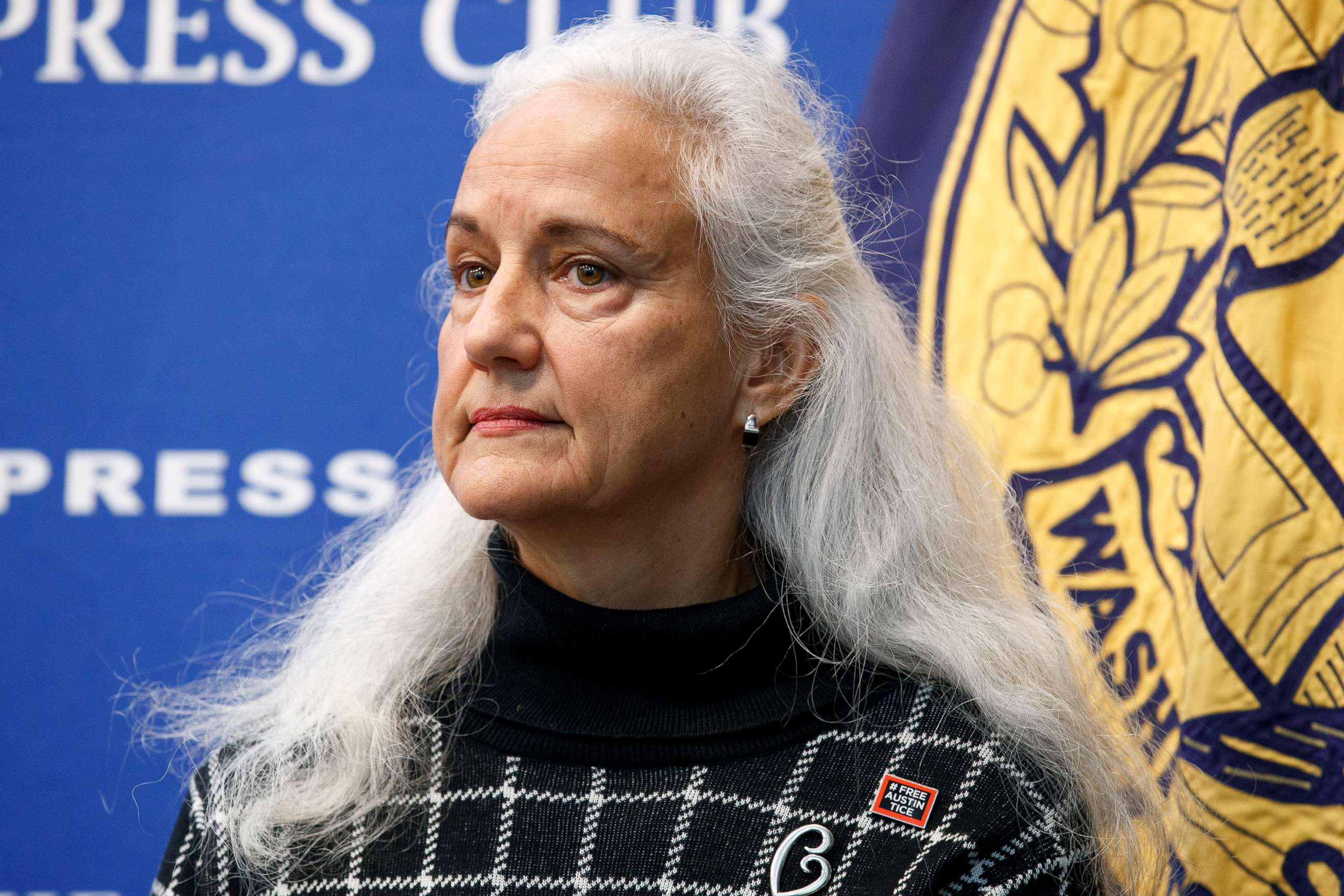 PHOTO: Debra Tice, the mother of detained journalist Austin Tice, listens as she is introduced before speaking about her son's detention at the National Press Club in Washington, Jan. 27, 2020.