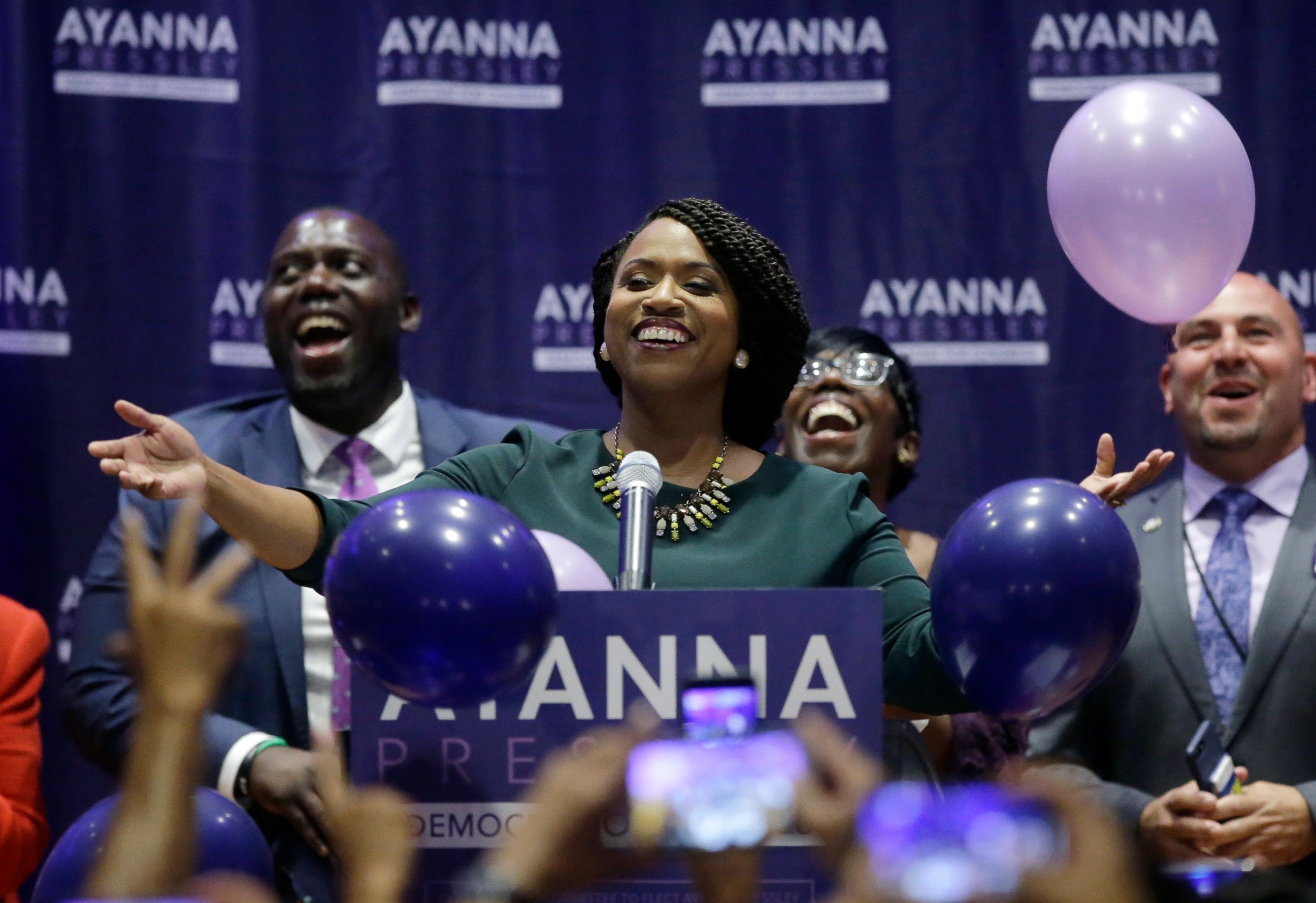 Boston City Councilor Ayanna Pressley, center, celebrates victory over U.S. Rep. Michael Capuano, D-Mass., in the 7th Congressional House Democratic primary, Tuesday, Sept. 4, 2018, in Boston.