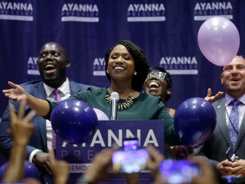 Boston City Councilor Ayanna Pressley, center, celebrates victory over U.S. Rep. Michael Capuano, D-Mass., in the 7th Congressional House Democratic primary, Tuesday, Sept. 4, 2018, in Boston.