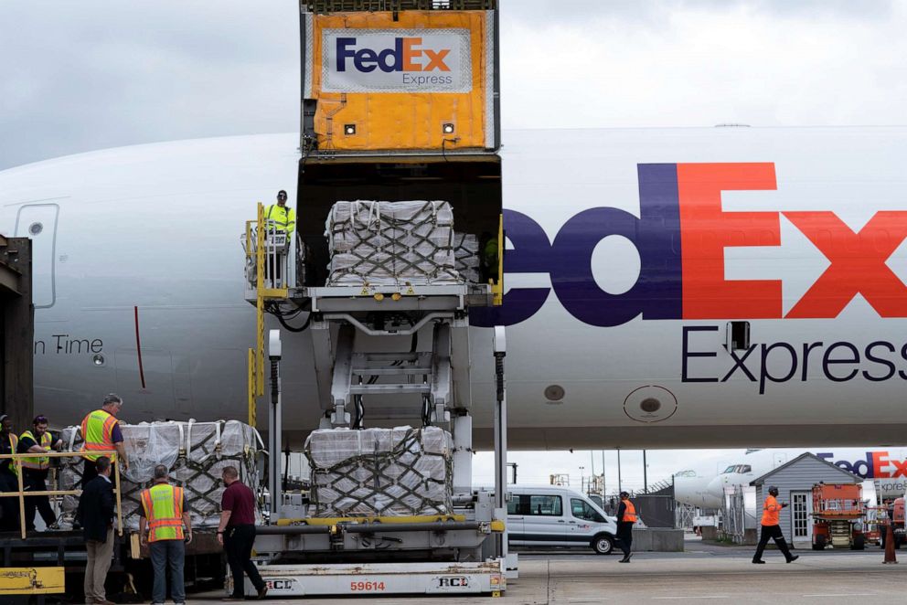 PHOTO: Workers unload a Fedex Express cargo plane carrying 100,000 pounds of baby formula at Washington Dulles International Airport, in Chantilly, Va., on May 25, 2022.