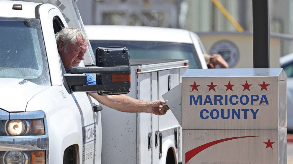  A elector  places a ballot successful  a driblet  container  extracurricular  of the Maricopa County Elections Department, connected  Aug. 2, 2022 successful  Phoenix.