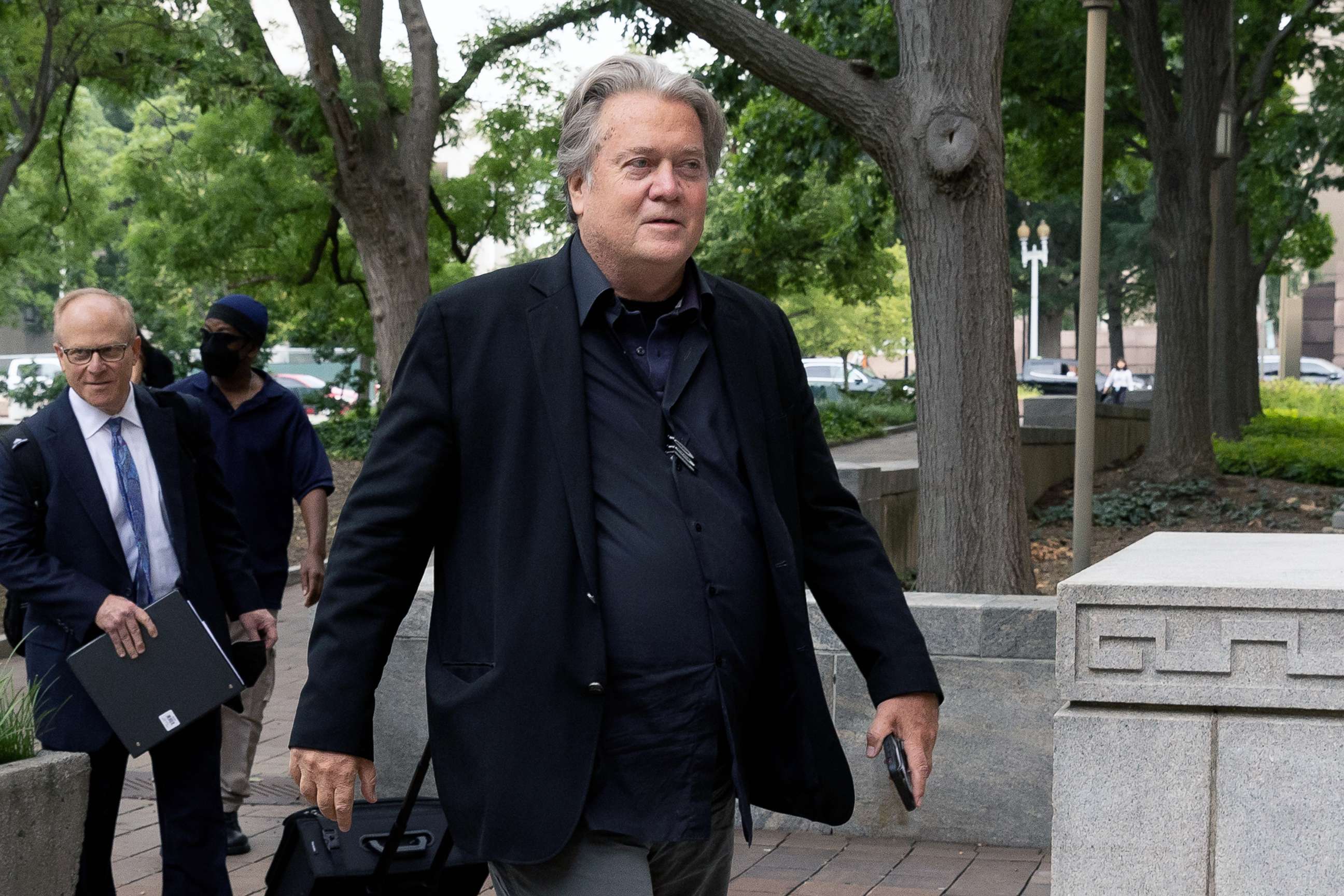 PHOTO: Former White House Chief Strategist in the Trump administration Steven Bannon (R) arrives with attorney David Schoen (L) at the E. Barrett Prettyman Federal Courthouse in Washington, D.C., July 18, 2022.