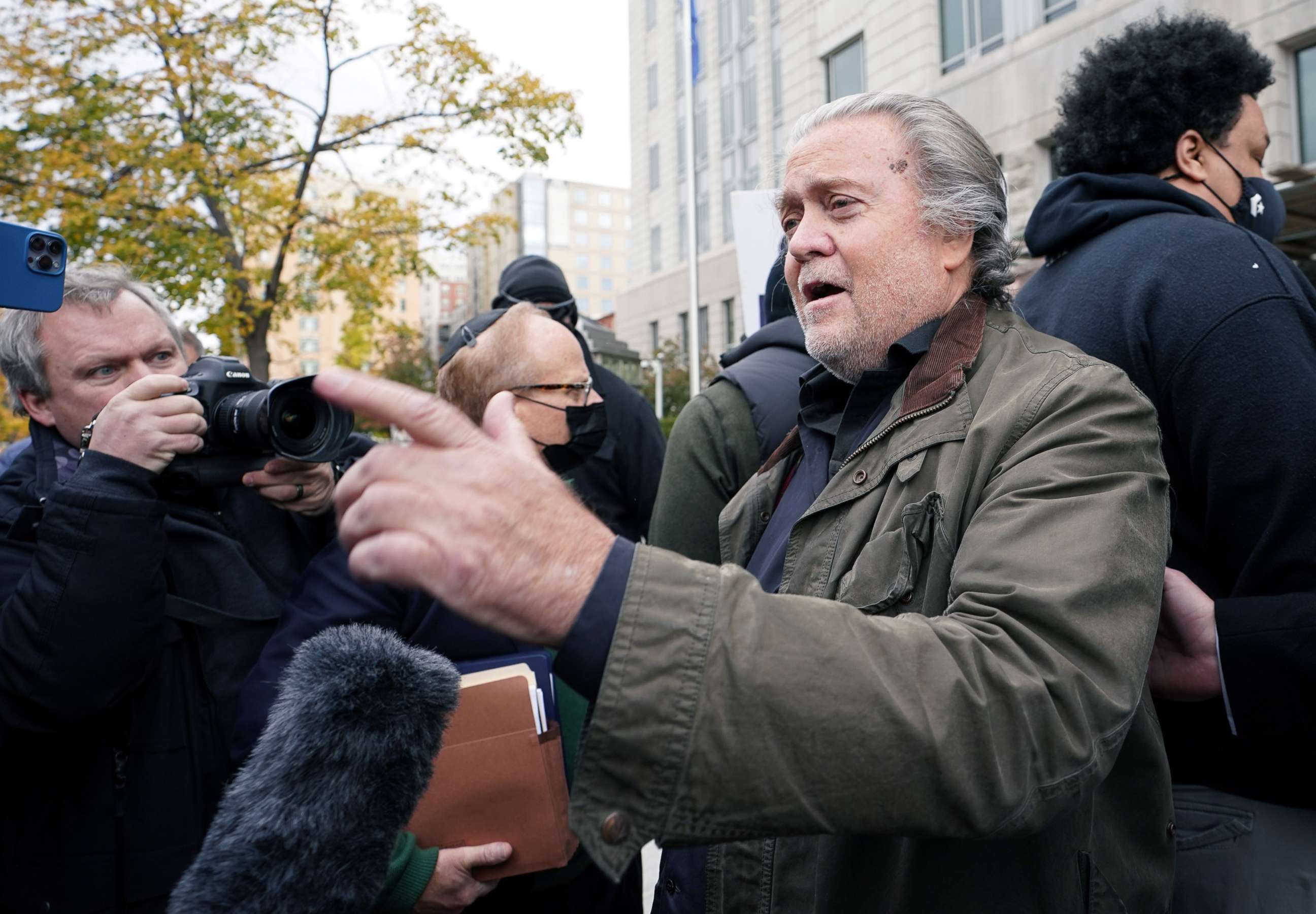 PHOTO: Steve Bannon, talk show host and former White House advisor to former President Donald Trump, speaks to media as he arrives at the FBI's Washington field office to turn himself in to federal authorities in Washington, Nov. 15, 2021.
