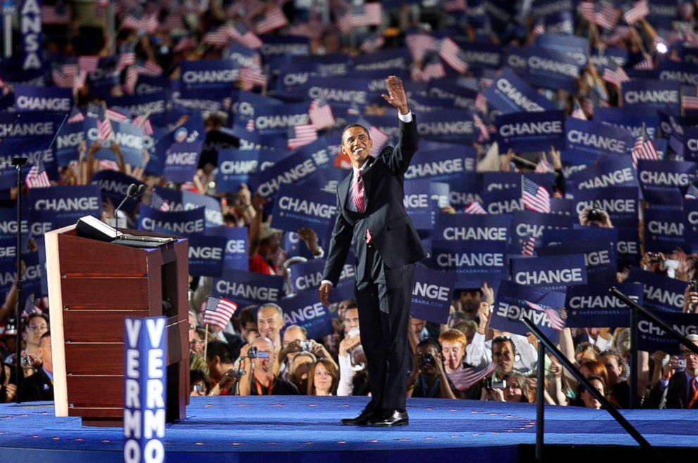 PHOTO: Barack Obama waves to the more than 70,000 people that gathered to hear him accept the Democratic Party nomination on Aug. 28, 2008 at Invesco Field in Denver, Colo.