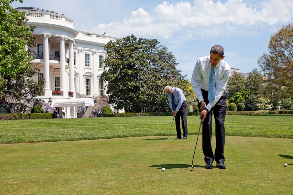 PHOTO: President Barack Obama and Vice President Joe Biden practice their putting on the White House putting green in Washington, April 24, 2009.