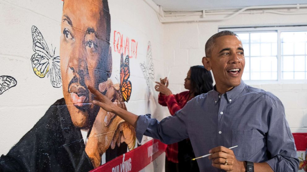 PHOTO: President Barack Obama and first lady Michelle Obama help paint a mural depicting Martin Luther King Jr., at the Jobs Have Priority Naylor Road Family Shelter, Jan. 16, 2017 in Washington.