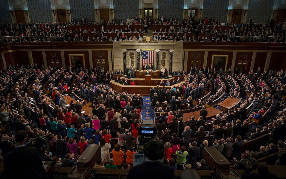 PHOTO: Members of Congress stand up to applaud as President Barack Obama speaks during his final State of the Union to a joint session of Congress in the House Chamber on Capitol Hill in Washington, Jan. 12, 2016.