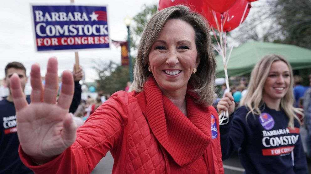 Rep. Barbara Comstock (R-VA) waves to constituents during the annual Haymarket Day parade, Oct. 20, 2018, in Haymarket, Va.