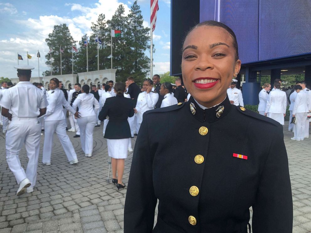 PHOTO: Midshipman Sydney Barber, who served as the first Black female Brigade commander at the U.S.Naval Academy this year, poses for a photo while gathering with other graduating midshipmen, May 28, 2021 in Annapolis, Md.