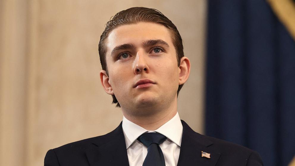 PHOTO: Barron Trump attends the inauguration of his father US President-elect Donald Trump in the Rotunda of the US Capitol on January 20, 2025 in Washington, DC.