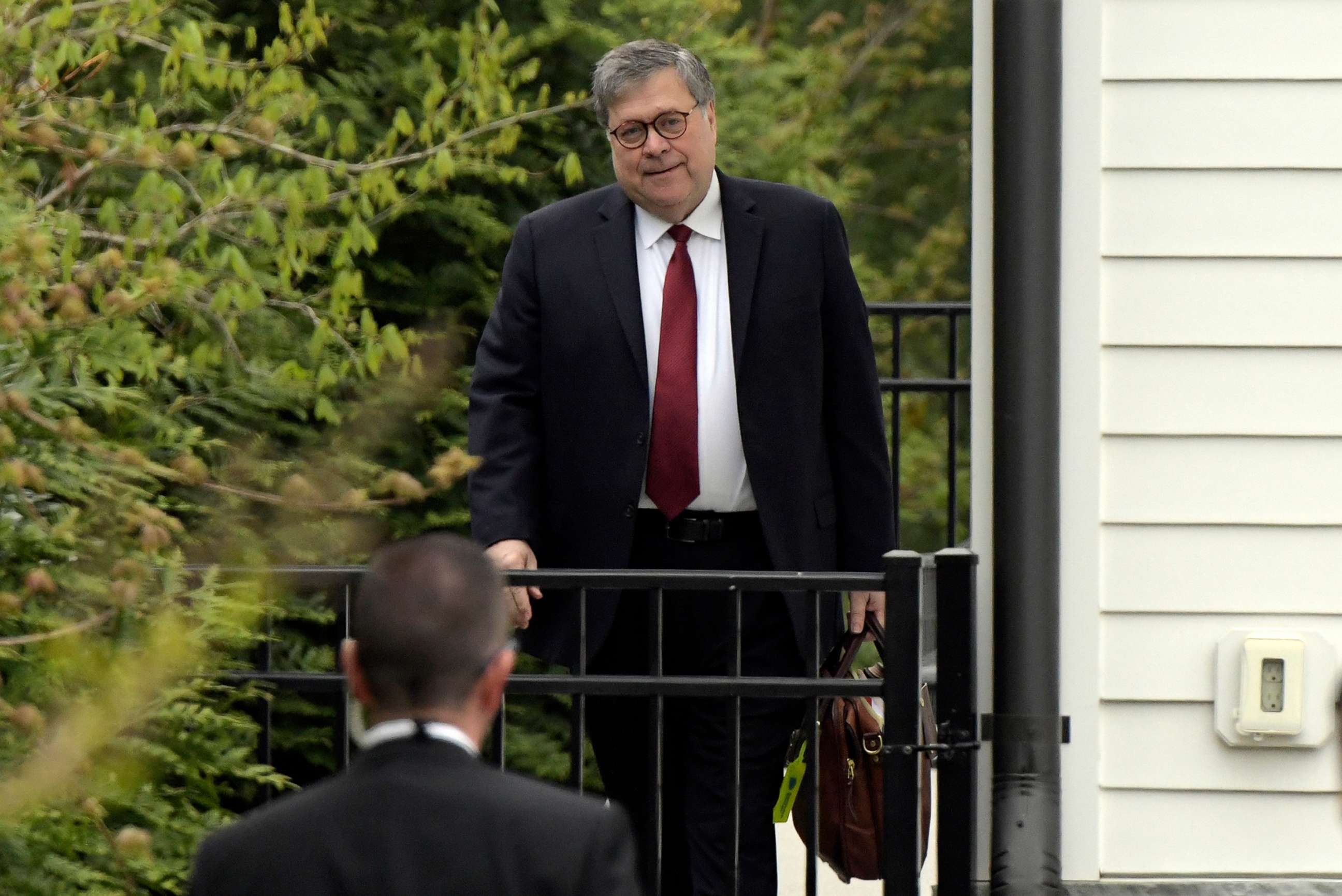 PHOTO: Attorney General William Barr leaves his home in McLean, Va., April 18, 2019.