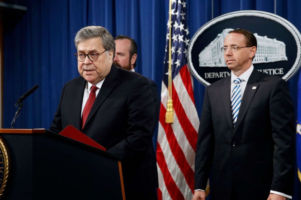 PHOTO: Attorney General William Barr speaks alongside Deputy Attorney General Rod Rosenstein, right, and Deputy Attorney General Ed O'Callaghan about the release of special counsel Robert Mueller's report, in Washington, D.C.,  April 18, 2019.