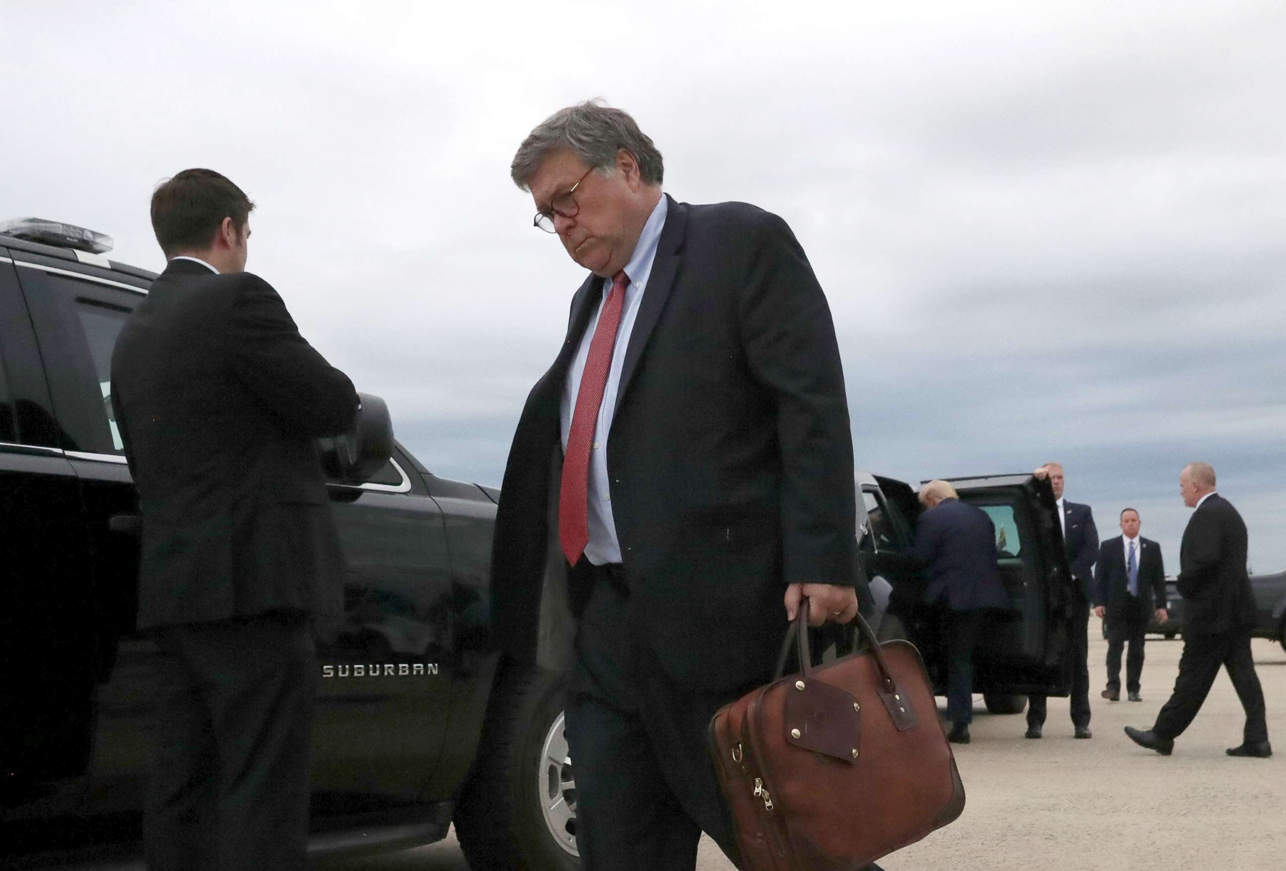 PHOTO: U.S. Attorney General Bill Barr walks to a waiting car upon arriving aboard Air Force One with President Donald Trump, following a day trip to Kenosha, Wis., after landing at Joint Base Andrews, Md., Sept. 1, 2020.