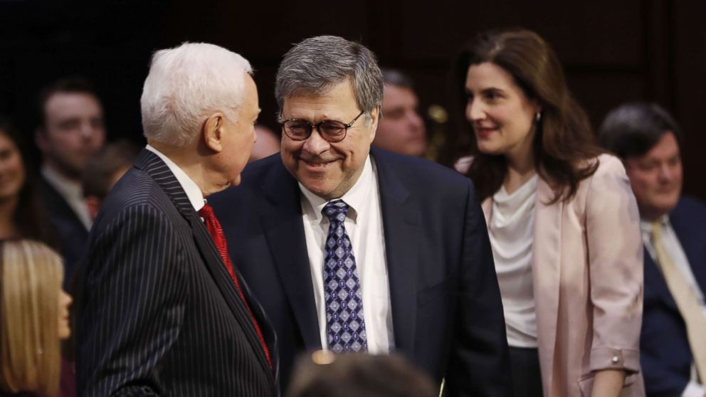 PHOTO: Former US Attorney General William Barr, right, is greeted by Republican Senator Orrin Hatch of Utah, left, as he arrives to the confirmation hearing in Washington, D.C. Jan. 15, 2019.