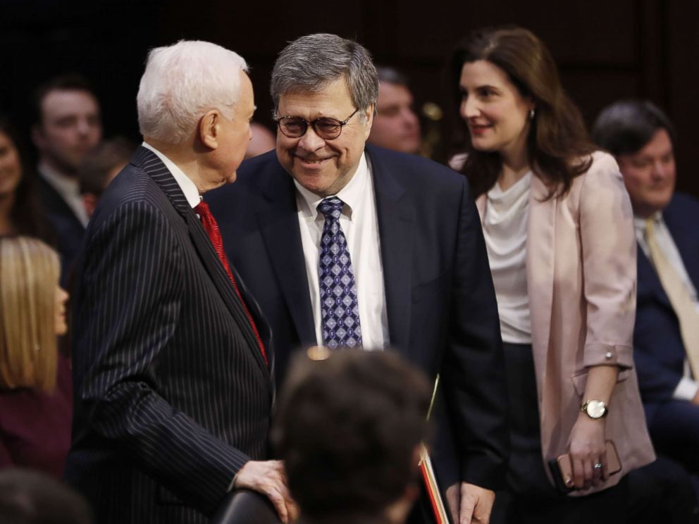 PHOTO: Former US Attorney General William Barr, right, is greeted by Republican Senator Orrin Hatch of Utah, left, as he arrives to the confirmation hearing in Washington, D.C. Jan. 15, 2019.