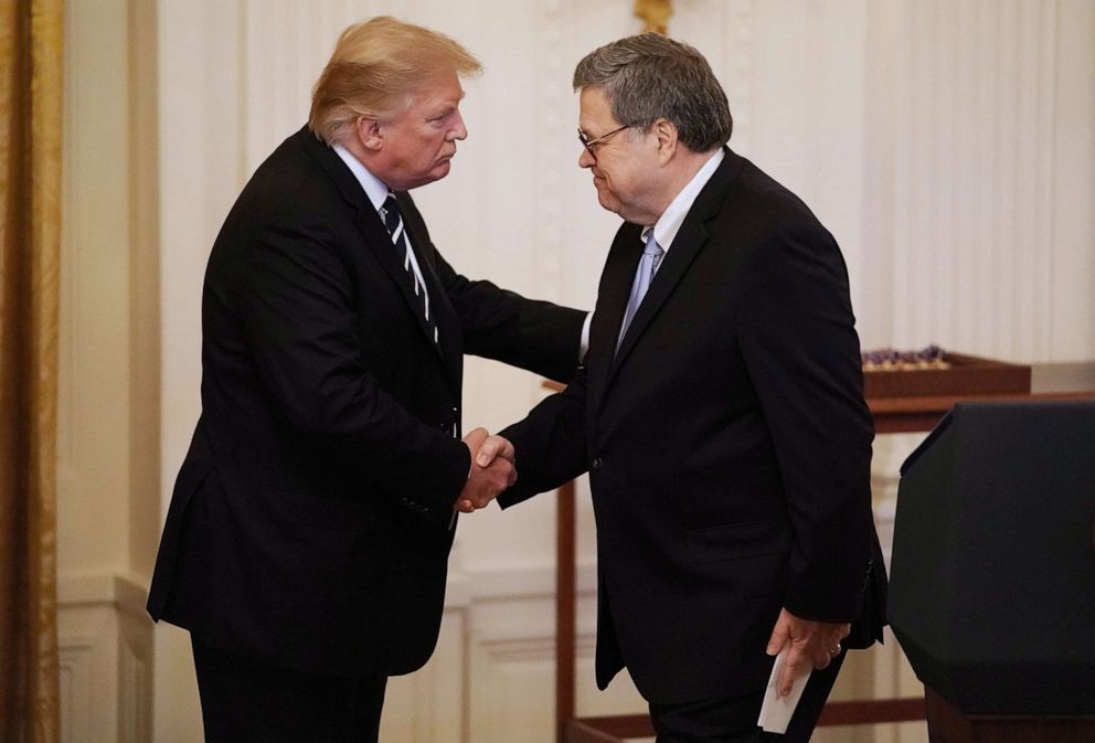 PHOTO: President Donald Trump shakes hands with Attorney General William Barr during a ceremony in the East Room of the White House, May 22, 2019, in Washington, DC.
