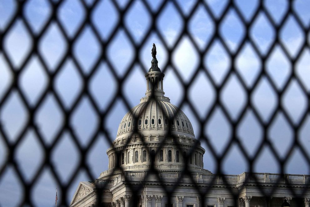 PHOTO: The Capitol Dome is seen through security fencing, May 12, 2021.