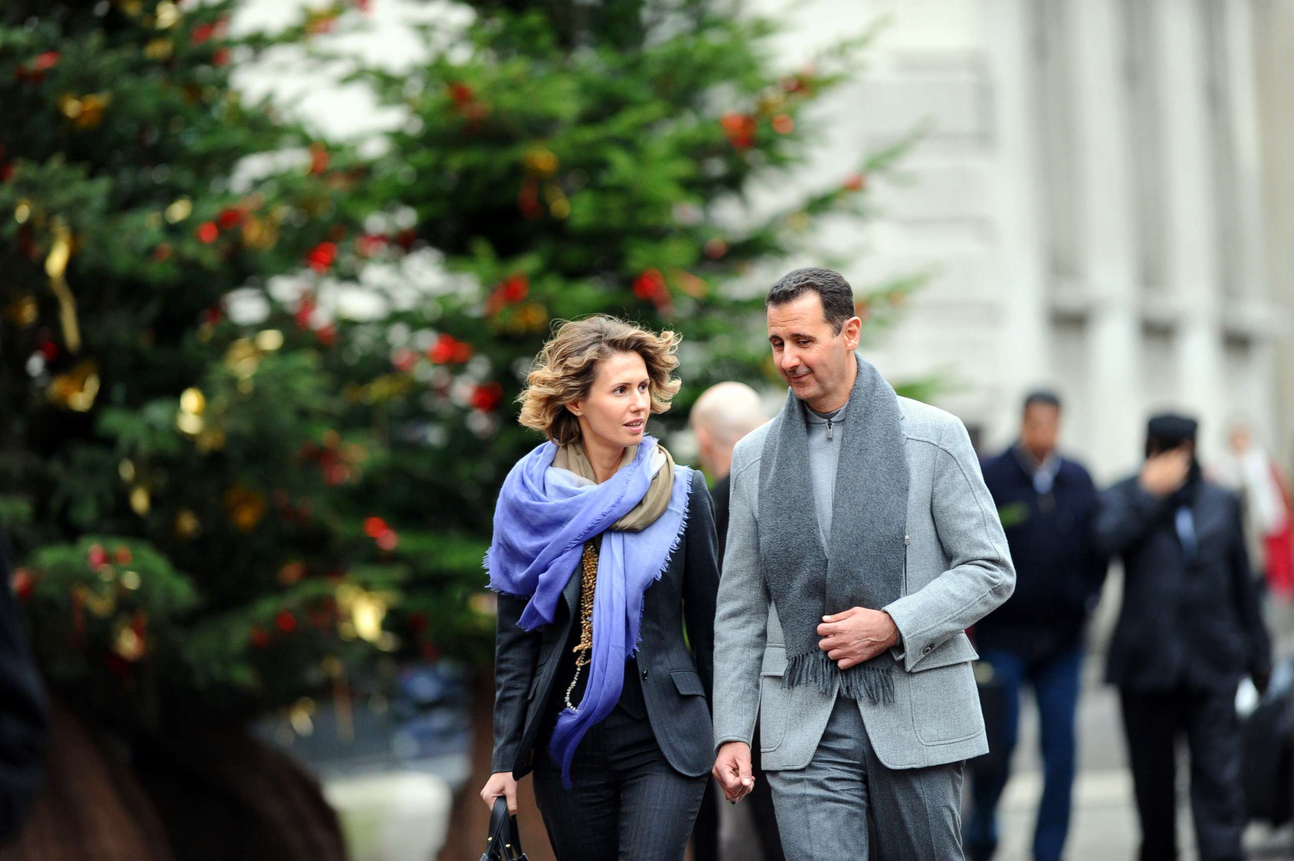 PHOTO: Syrian president Bashar al-Assad and his wife Asma walk in Paris, Dec. 10, 2010.