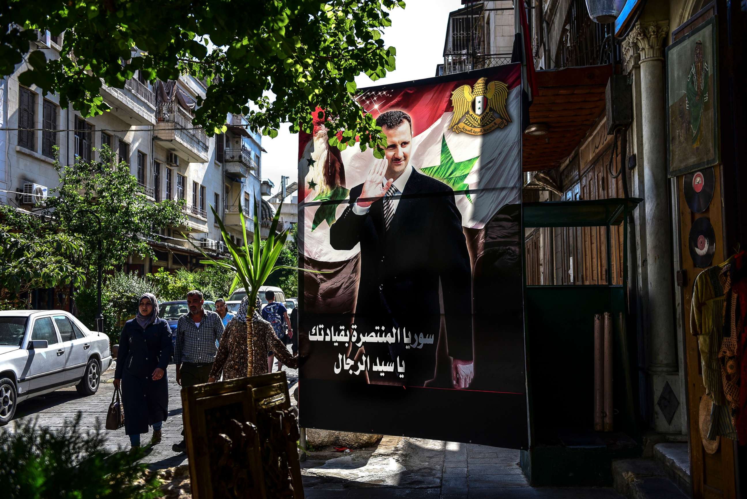 PHOTO: A banner of President Bashar Assad of Syria in Damascus, June 24, 2019.