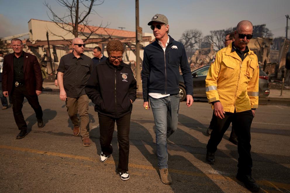 PHOTO: California Governor Gavin Newsom and Los Angeles Mayor Karen Bass tour the downtown business district of Pacific Palisades as the Palisades Fire continues to burn, Jan. 8, 2025, in Los Angeles.