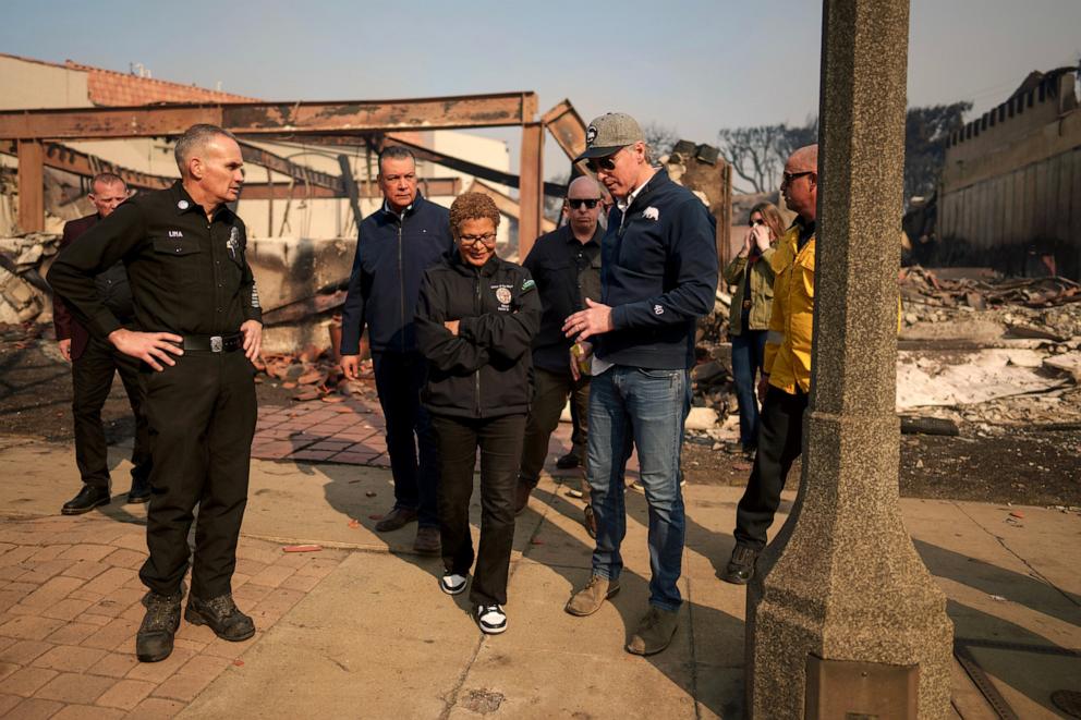 PHOTO: California Governor Gavin Newsom and Los Angeles Mayor Karen Bass tour the downtown business district of Pacific Palisades as the Palisades Fire continues to burn, Jan. 8, 2025, in Los Angeles.