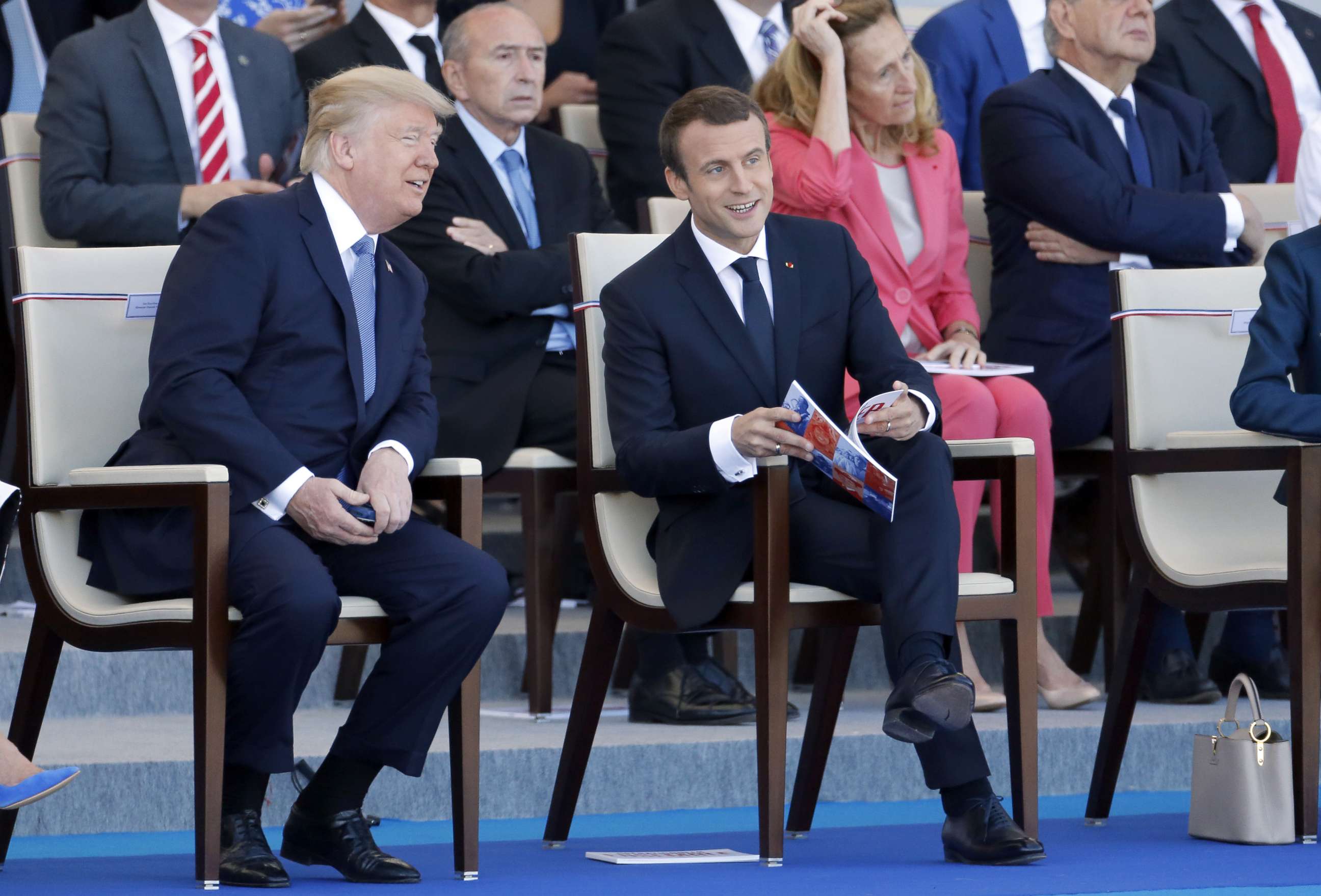 PHOTO: President Donald Trump and French President Emmanuel Macron attend the traditional Bastille day military parade on the Champs-Elysees, July 14, 2017, in Paris. 