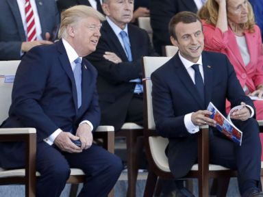 PHOTO: President Donald Trump and French President Emmanuel Macron attend the traditional Bastille day military parade on the Champs-Elysees, July 14, 2017, in Paris.