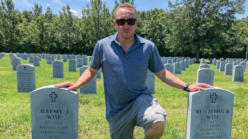 PHOTO: Beau Wise visits the gravestones of his brothers on June 23, 2019.